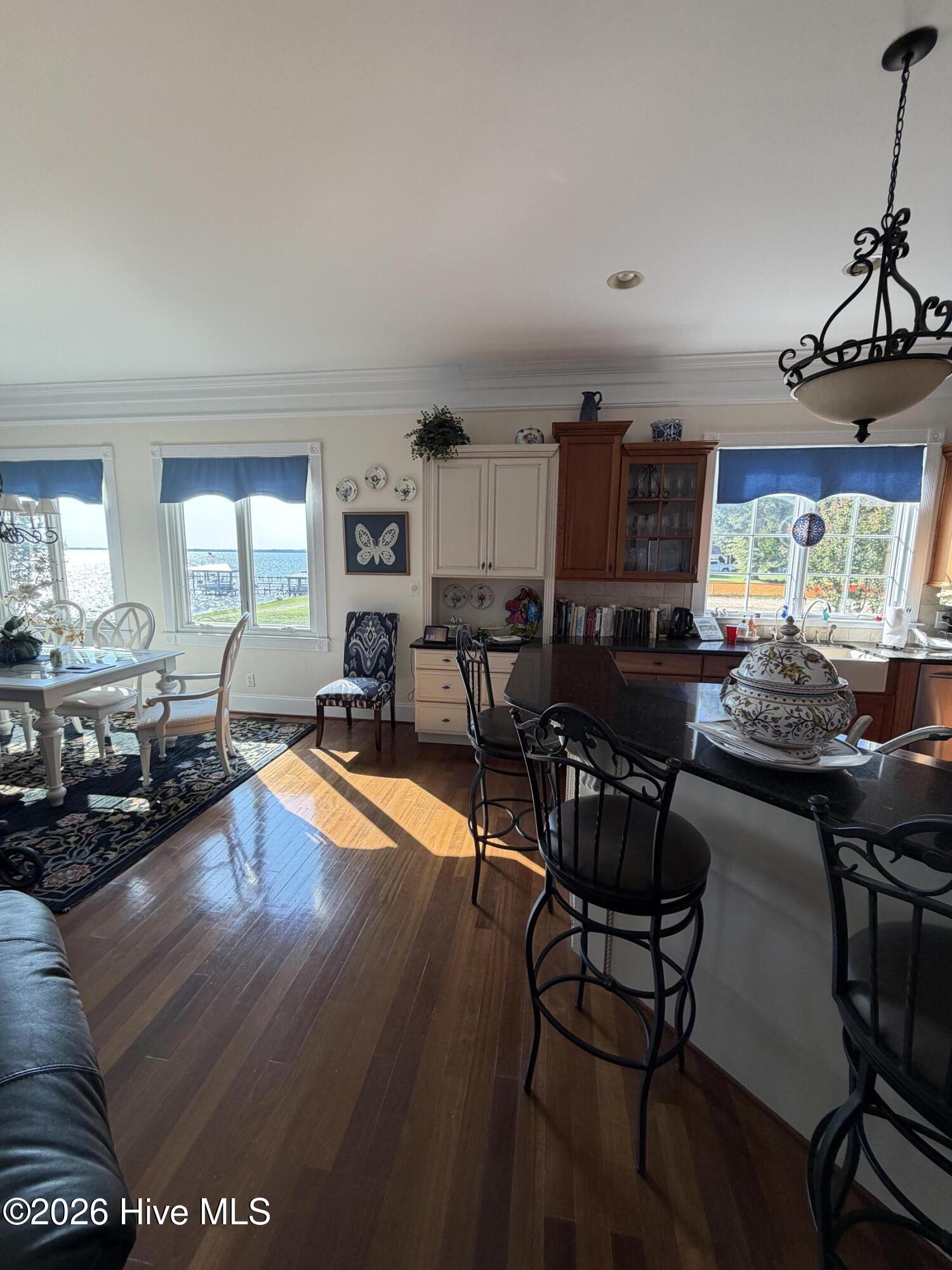 Kitchen to the right. Family Space to the left. All w great views of the Albemarle Sound. And look at this beautiful Brazilian Cherry floors.
