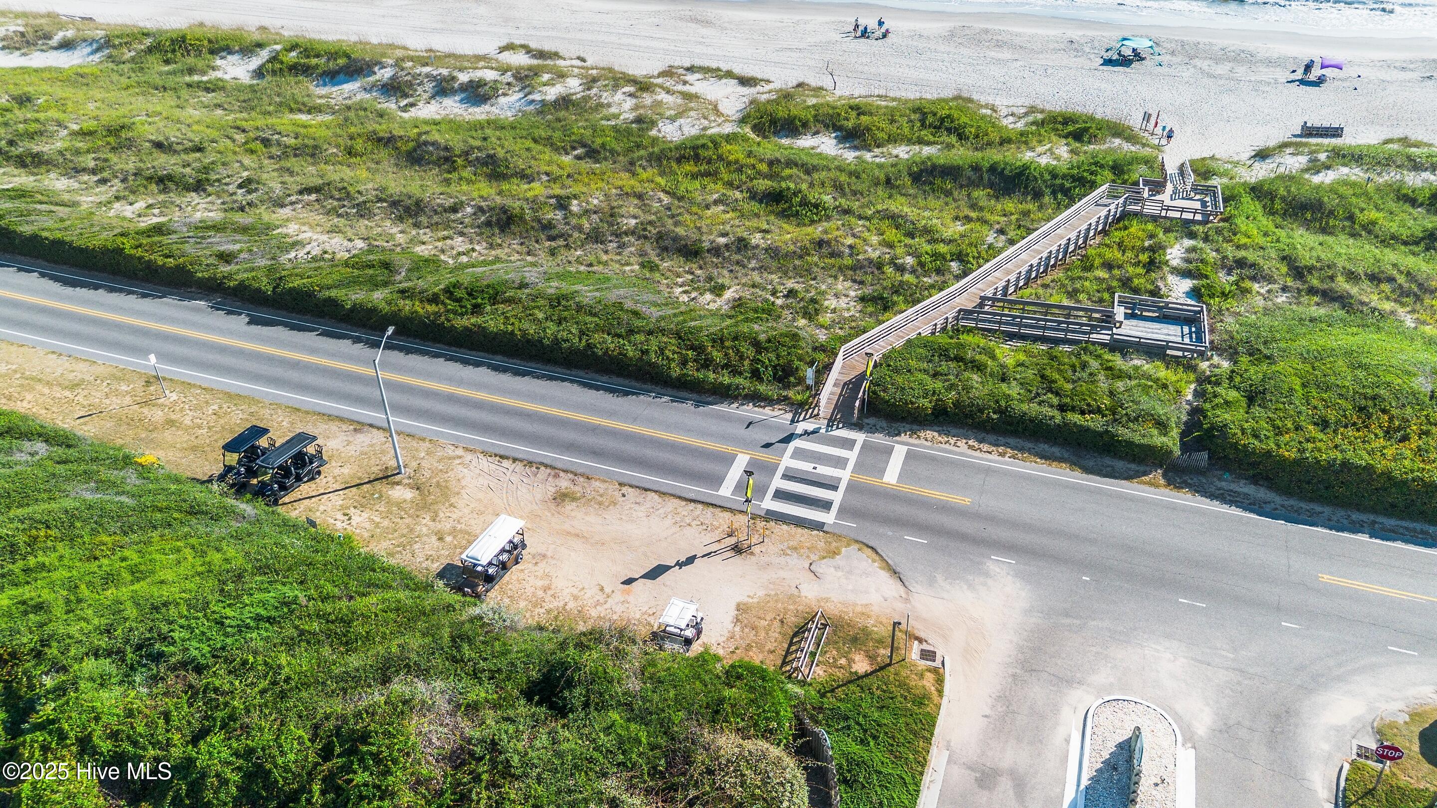 501 Periwinkle Way, Caswell Beach, NC 28465 – photo 13: mls-DJI_0045