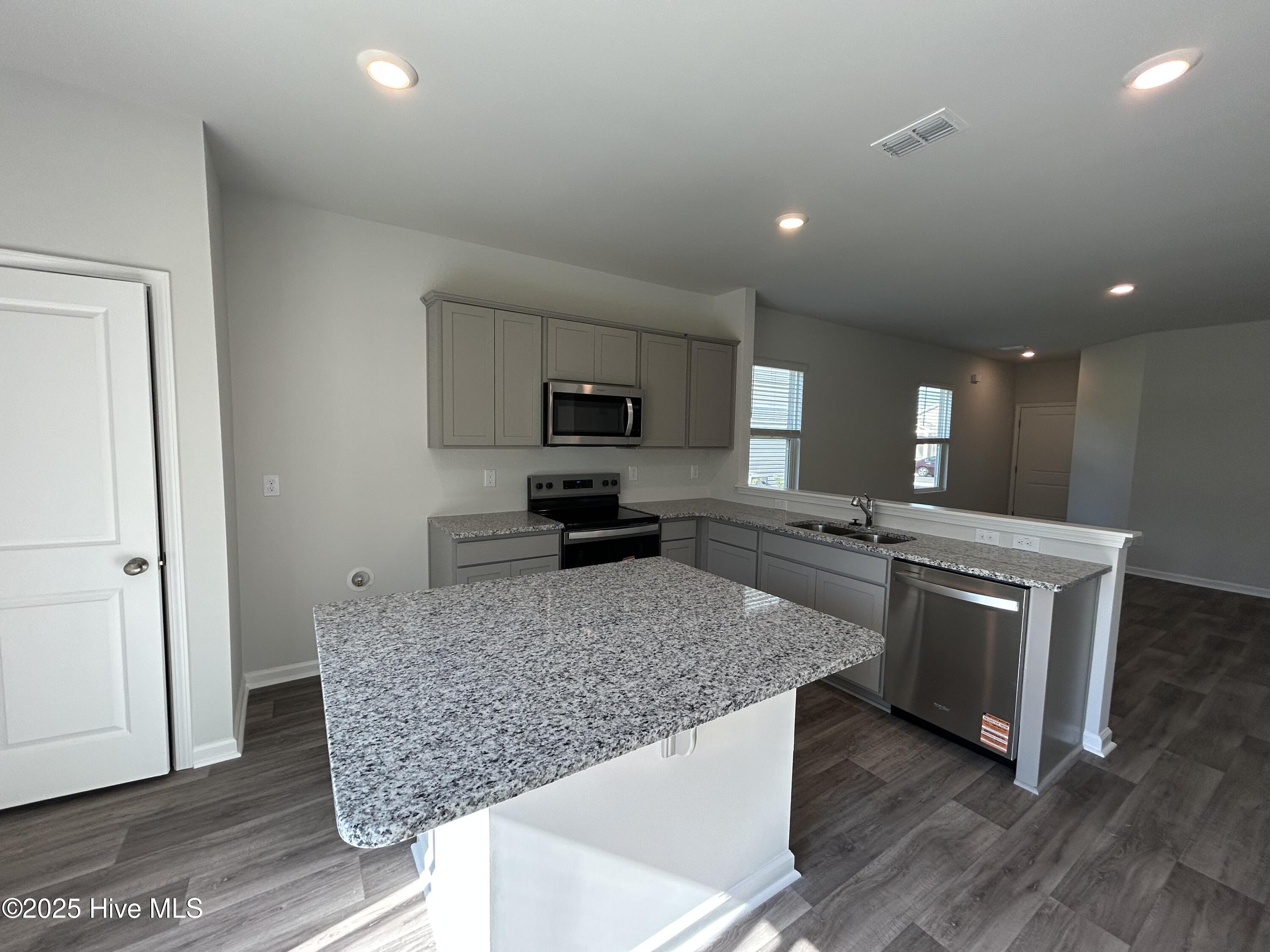 568 Coronado Avenue SE 16, Leland, NC 28451 – photo 9: Kitchen Island