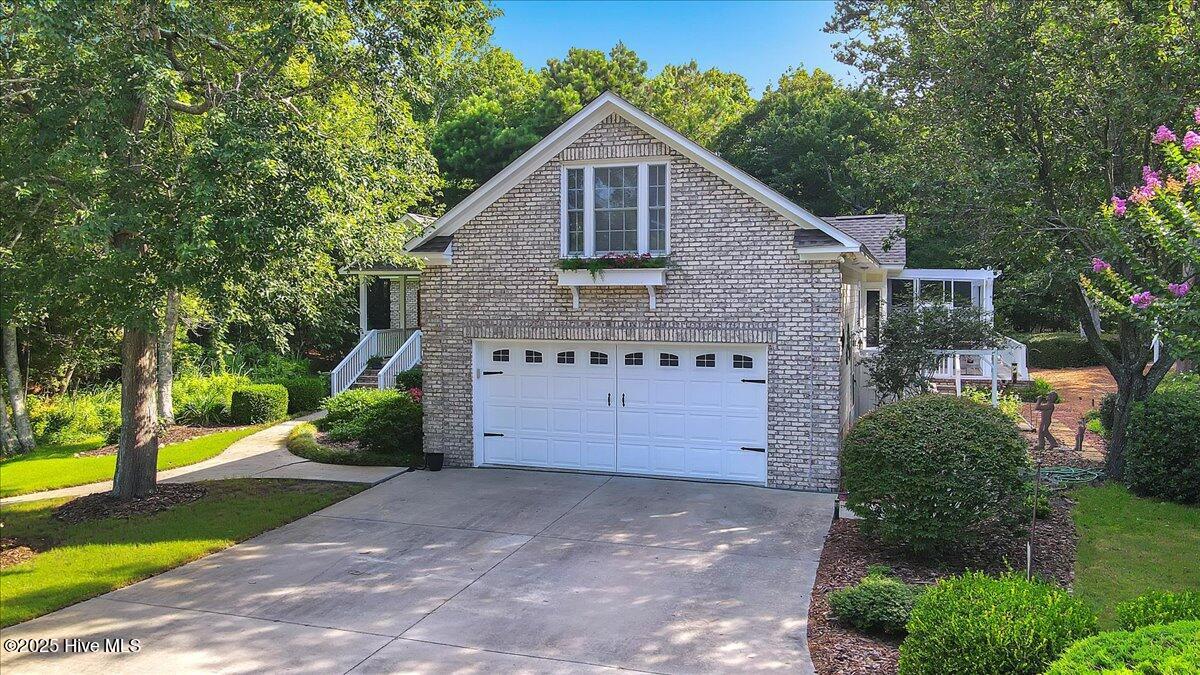 301 Wisteria Way, Caswell Beach, NC 28465 – photo 5: 59-Final 301 Wisteria Way Caswell Beach