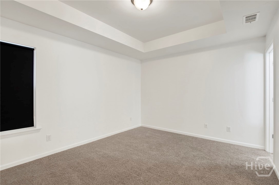 Spacious Primary with Trey Ceiling