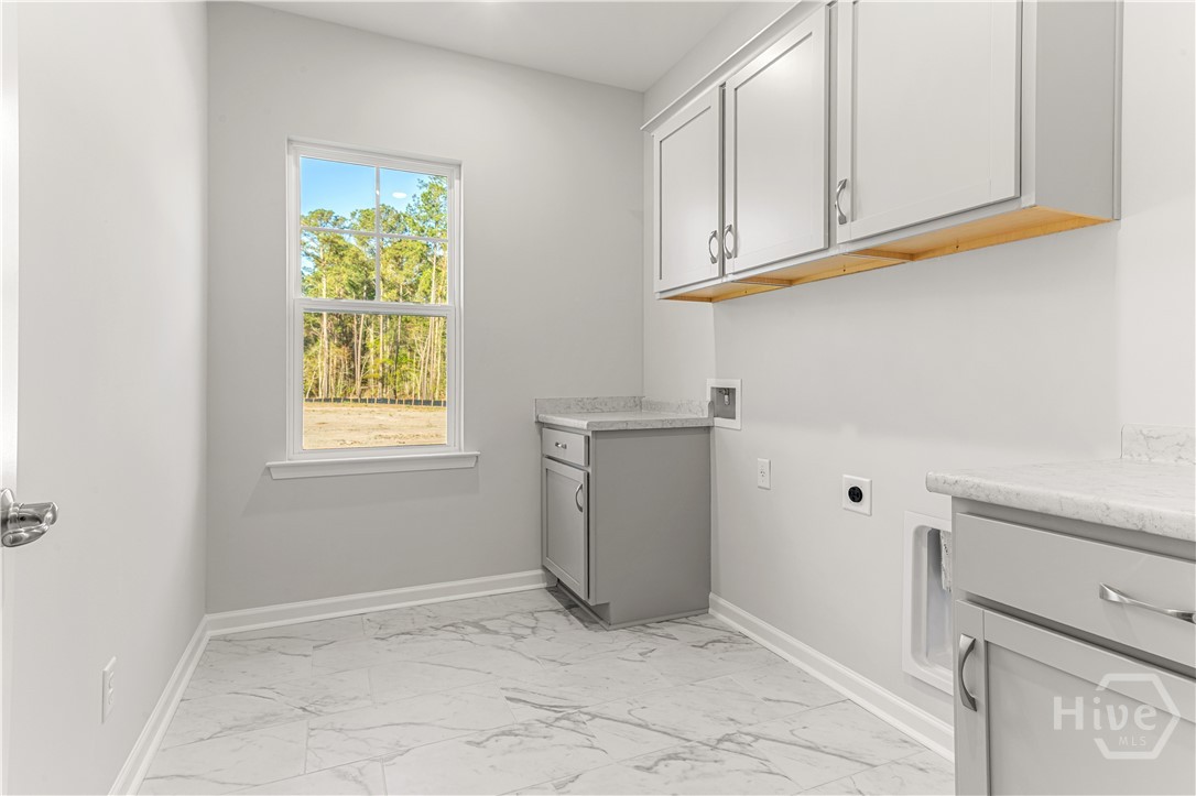 Laundry Room With Upper and Lower