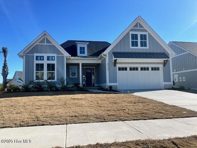 Welcome to this stunning modern farmhouse, where style meets functionality.  Built by Fogleman Homes, the Cruz Bay has an open floor plan, enhanced by gorgeous wood flooring, that creates a seamless flow between the living, dining, and kitchen areas. A bright sunroom extends from the great room, offering a peaceful retreat with serene nature views. The formal dining room adds elegance, while the gourmet kitchen is perfectly positioned for both casual and formal gatherings. The private primary suite overlooks the backyard with spa-like amenities, while guest bedrooms at the front ensure comfort and privacy. Thoughtfully designed, this home blends modern farmhouse charm with everyday convenience.