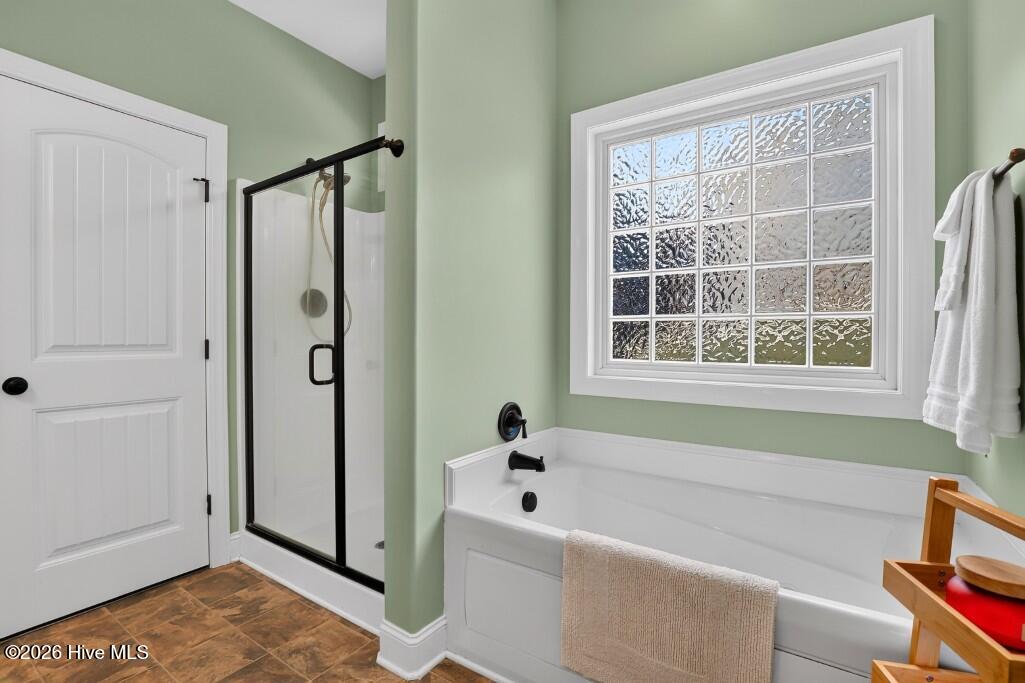 Primary with Stand Up Shower and Soaking Tub