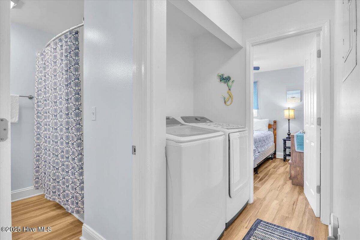 2714 W Beach Drive # 106, Oak Island, NC 28465 – photo 19: Hallway/Laundry