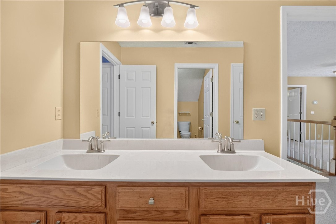Jack N jill bathroom upstairs with double vanities