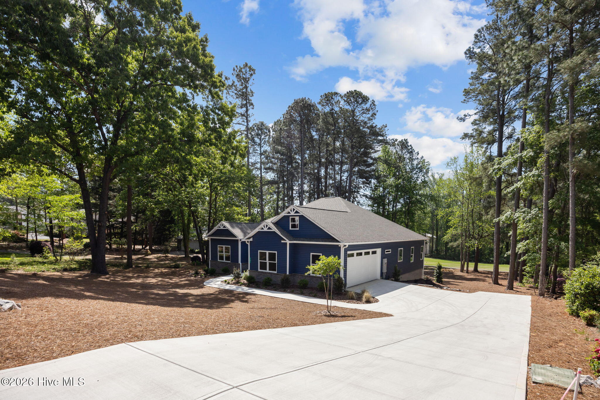 Exterior photo of 107 Devonshire Avenue W, Seven Lakes, NC 27376. MLS: 100600584