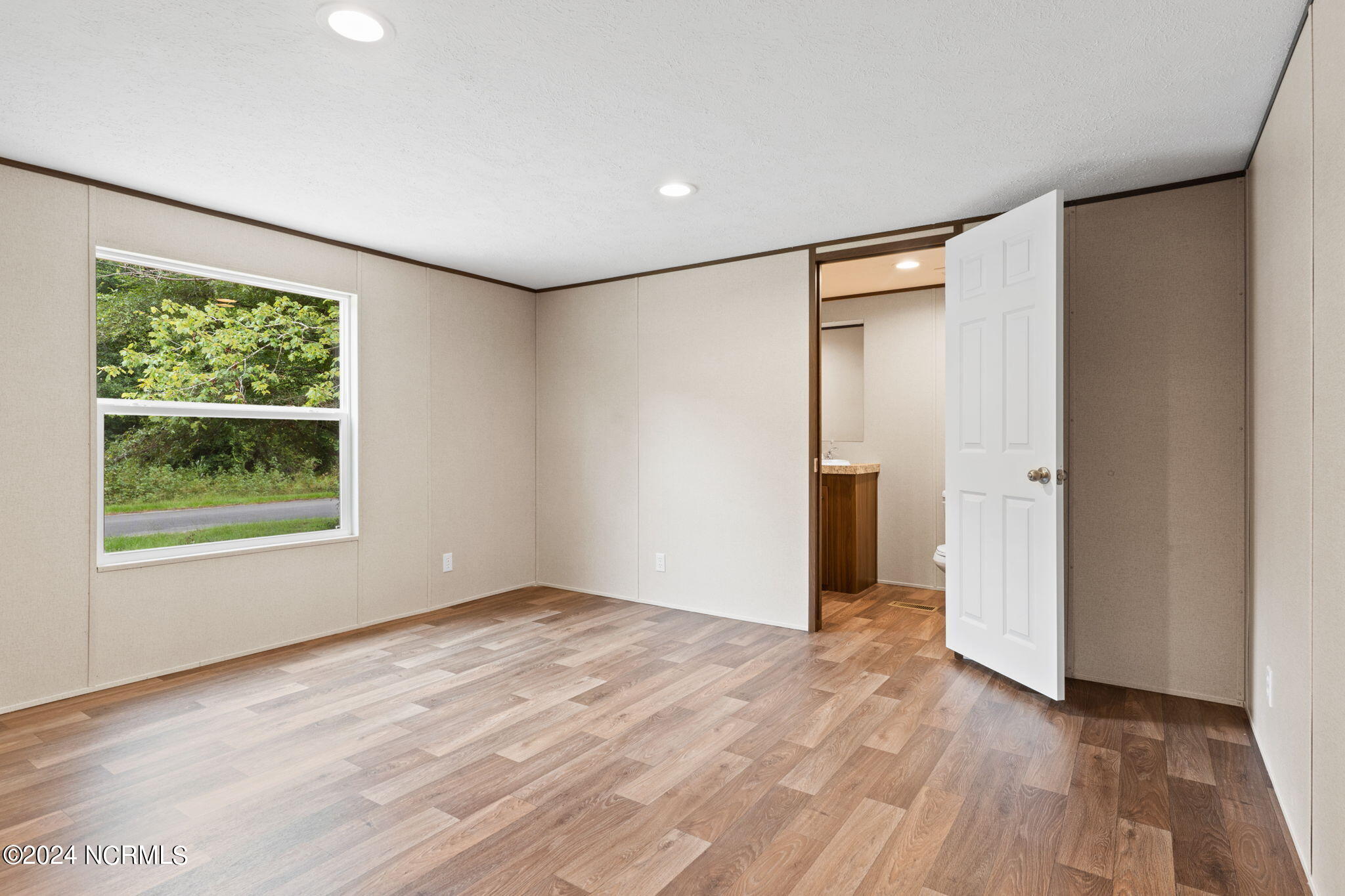 1404 Mockingbird Place SW, Shallotte, NC 28470 – photo 15: Primary Bedroom