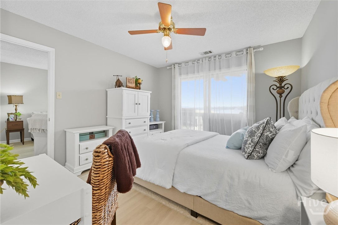 An additional sliding door leads to the balcony.