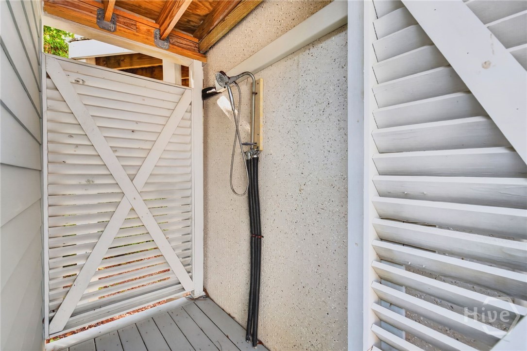 outdoor shower on rear deck with hot and cold water