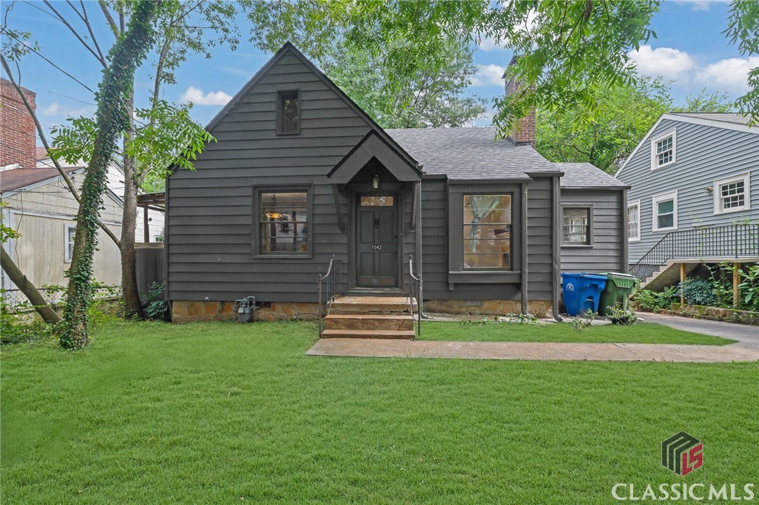 Location, Location! This charming cottage is tucked into North Ormewood Park and is just a block from Glenwood Park and within minutes from the EastSide BeltLine trail, Madison Yards, and East Atlanta Village. The main level has a large family room with fireplace, breakfast room and large kitchen with granite countertops, industrial faucet and two bedrooms and a bathroom.. A light-filled  room off the family room offers flexibility as a home office or sunroom. Upstairs is a large room that can be a bedroom, office, playroom/craft room with a full bathroom. The backyard is huge and has a newly landscaped yard that is amazing with a fire pit and can be enjoyed after you grill out on the grilling deck.. There is a large shed in the backyard as well so plenty of storage space and parking in this  amazing location.