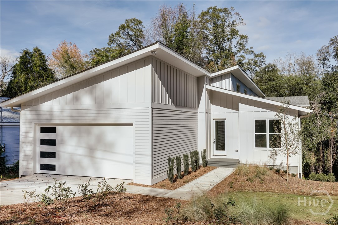 Step into this thoughtfully designed Normaltown residence, where soaring ceilings, clean architectural lines, and sun-filled interiors create a light and airy feel throughout. The home features stunning white oak hardwood floors that flow seamlessly through the main living areas and bedrooms, enhancing the natural warmth and cohesion of the space. Just off the main hallway, you'll find a versatile office or flex space-ideal as a fourth bedroom-alongside two well-appointed secondary bedrooms. Each bedroom includes a ceiling fan, walk-in closet, and private en-suite bath complete with custom vanities and stylish tile surrounds. At the heart of the home lies an expansive open-concept living area that blends the kitchen, dining, and living spaces-perfect for both entertaining and everyday living. The chef's kitchen is outfitted with custom cabinetry, gleaming quartz countertops, a classic tile backsplash, walk-in pantry, and sleek stainless steel appliances. A generous center island offers ample bar seating and extra cabinetry ideal for a coffee or cocktail bar. Step through the dining area onto the screened porch and back deck, where views of Brooklin Creek and the private backyard provide a quite outdoor space. Tucked just off the living room is a charming alcove-ideal for a reading nook, study, or play area. The spacious primary suite is complete with an en-suite bath featuring floating dual vanities, a tiled walk-in shower with multiple shower heads, and a roomy walk-in closet. The home also includes a substantial unfinished basement with both interior and exterior access-offering excellent potential for a future in-law suite, media room, home gym, or generous storage. Located within walking distance to UGA's Health Sciences Campus and the vibrant restaurants and nightlife of Normaltown, this home blends modern comfort with urban convenience. Schedule your tour today and experience it firsthand. Seller is a licensed real estate agent in the state of Georgia.   *Seller is a licensed realtor in the state of Georgia.