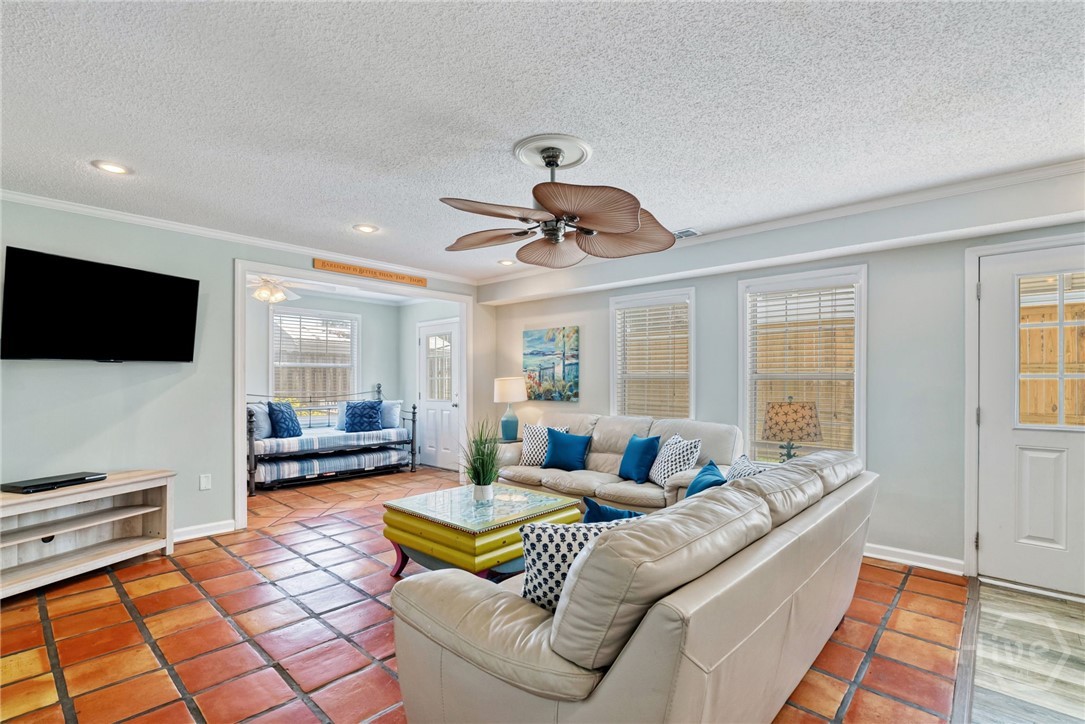 Spacious Living Room with Spanish Tile, Natural Li