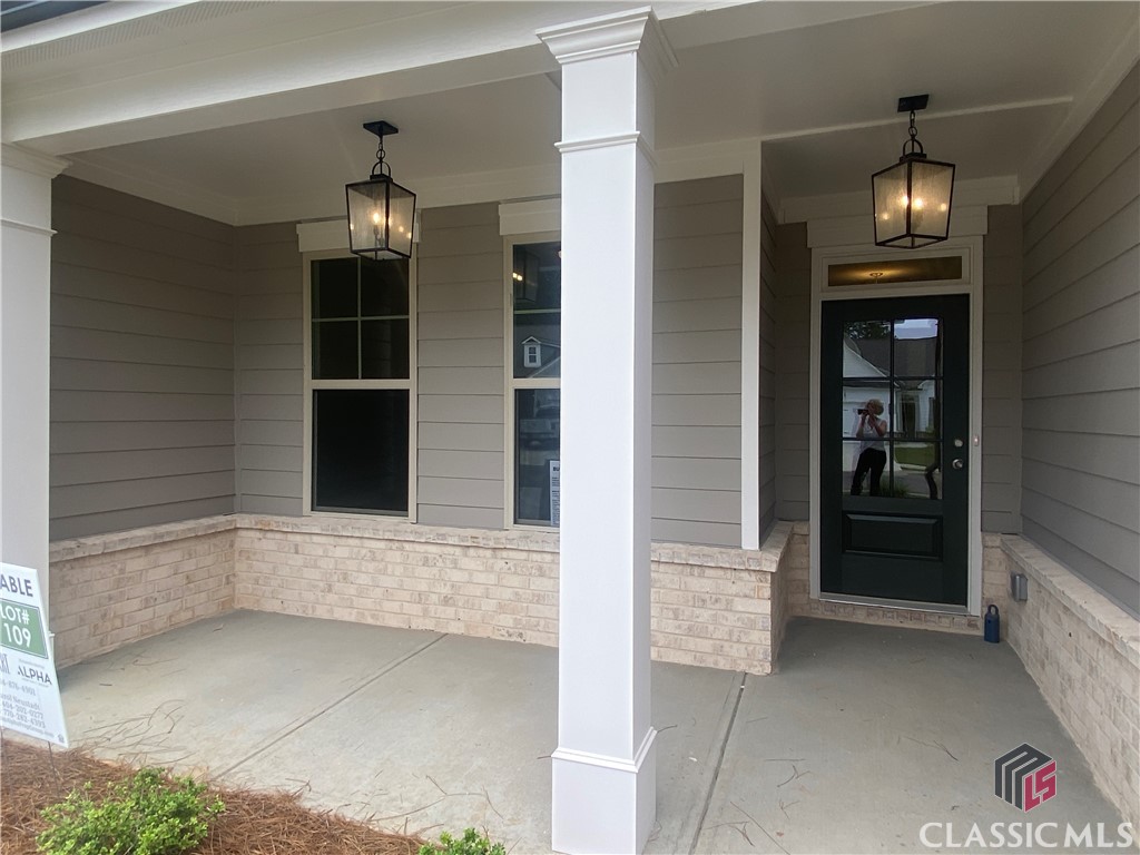Large welcoming covered front porch