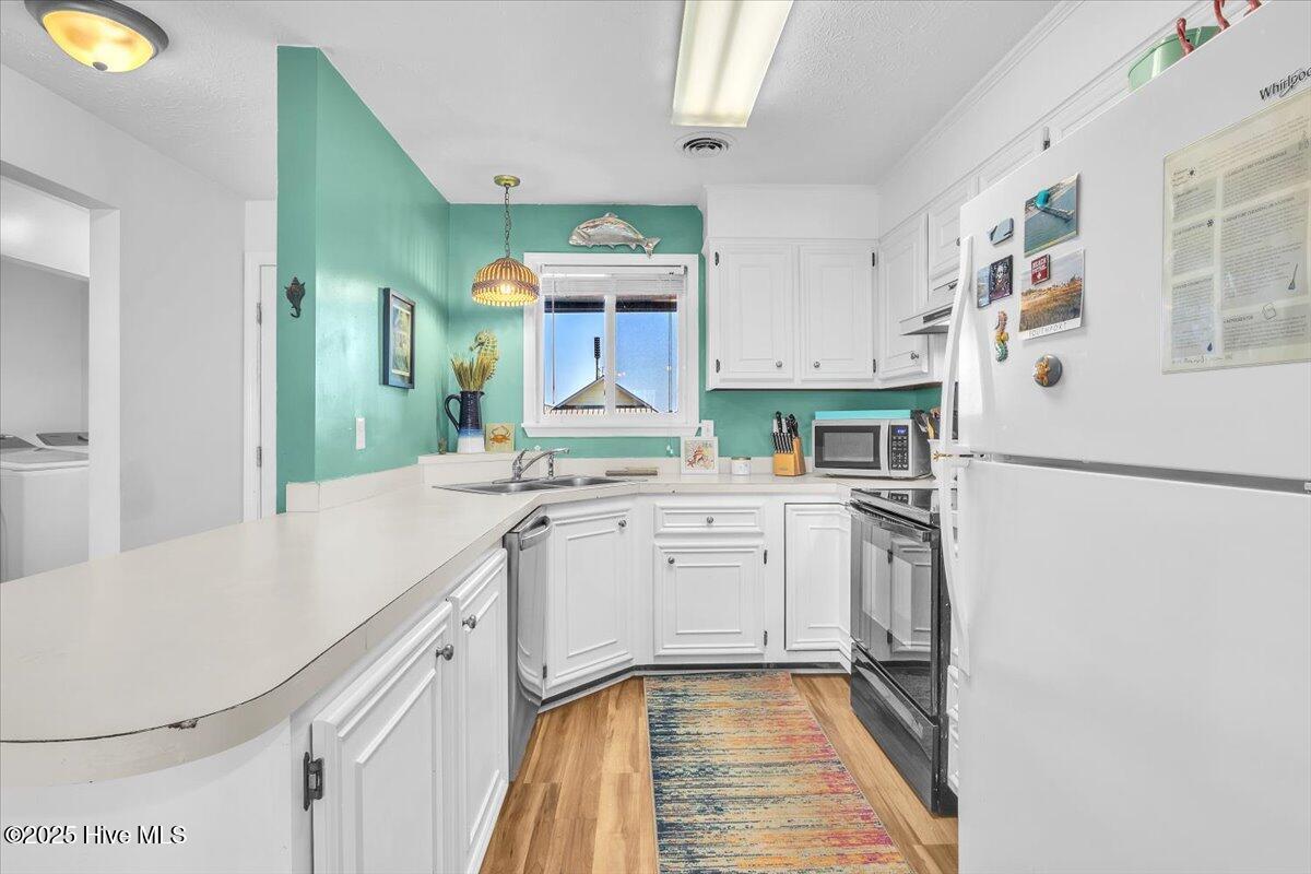 2714 W Beach Drive # 106, Oak Island, NC 28465 – photo 7: Kitchen