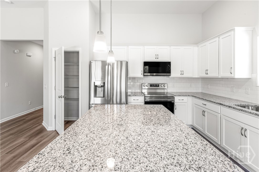 Kitchen Island with Open Pantry Door