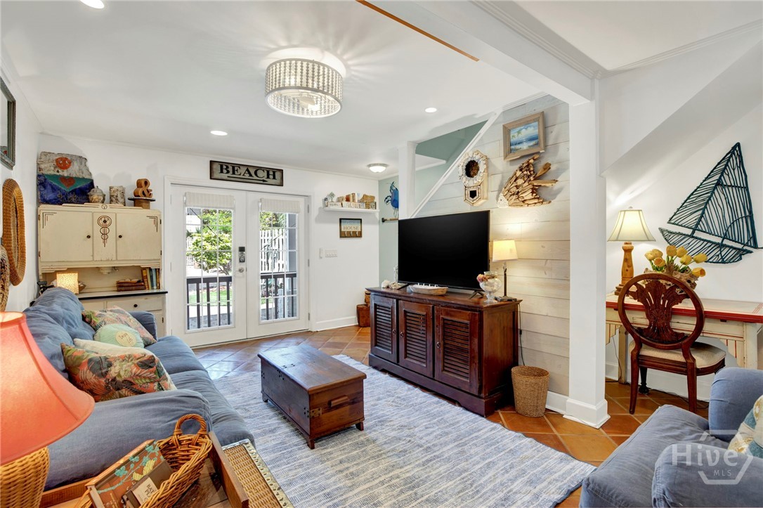 The interior stairwell leads to the main living ar