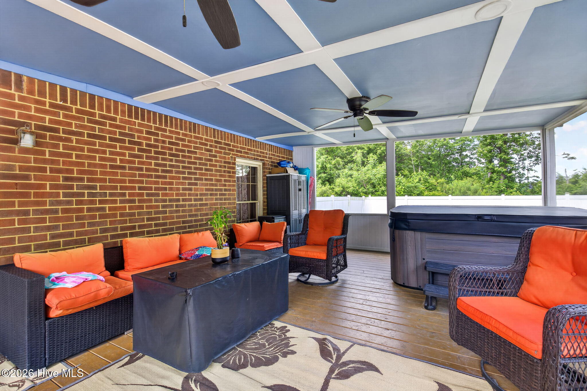 Screened in porch with hot-tub