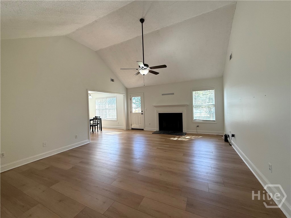 LIVING ROOM WITH FP AND NEW LVP FLOORING