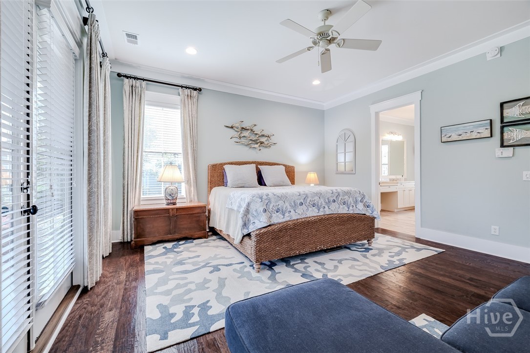 Spacious primary suite has lake views