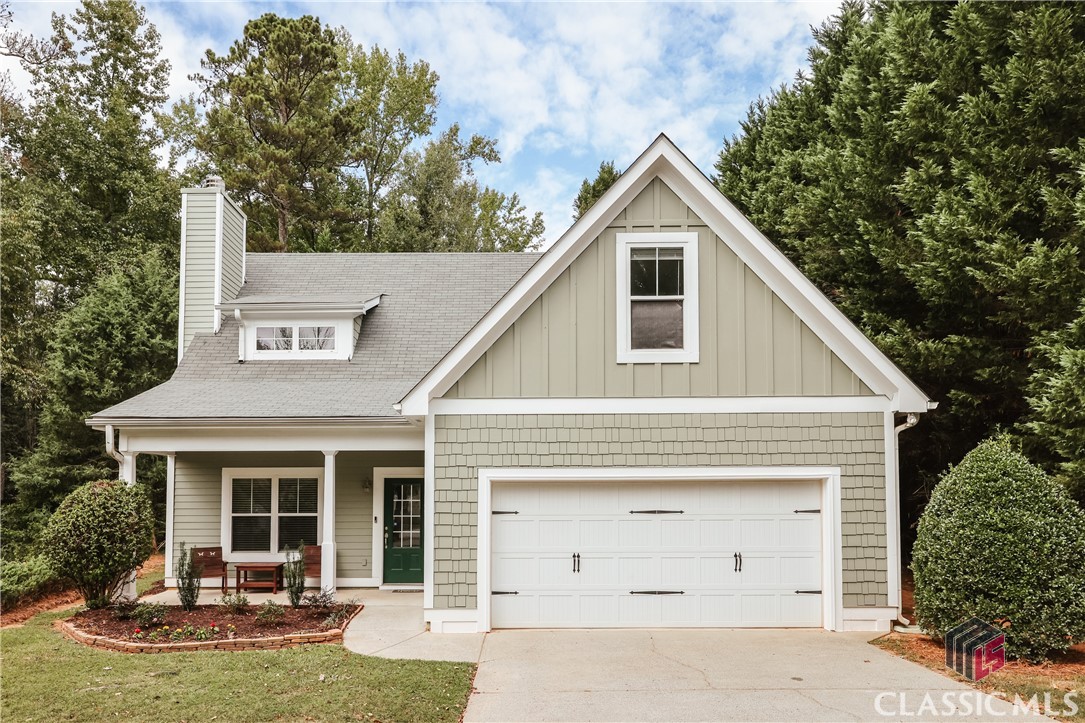 Welcome to 581 Edgewood Drive, a charming 3-bedroom, 2.5-bath Craftsman-style home nestled in the heart of Athens' desirable Brookfield Village. This home boasts an inviting floor plan with a spacious Bonus Room, cozy Family Room, and a light-filled Breakfast Room. The Owner's Suite is conveniently located on the main level, providing easy access to everyday living. The interior features a mix of hardwood, carpet, and vinyl flooring, adding warmth and character to each space. The kitchen has a cozy layout, equipped with sleek, modern appliances perfect for any home chef. Step outside to the private, fenced-in back patio, a perfect space for relaxation or entertaining.  The home is part of the Brookfield Village community, known for its bungalow-style architecture, charming front porches, and period details like Mission dormers and gable accents. Enjoy 5.5 acres of green space and stroll through sidewalks connecting you to your neighbors. Don't miss out on this beautifully crafted home in a peaceful neighborhood with modern conveniences. Schedule your tour today!
