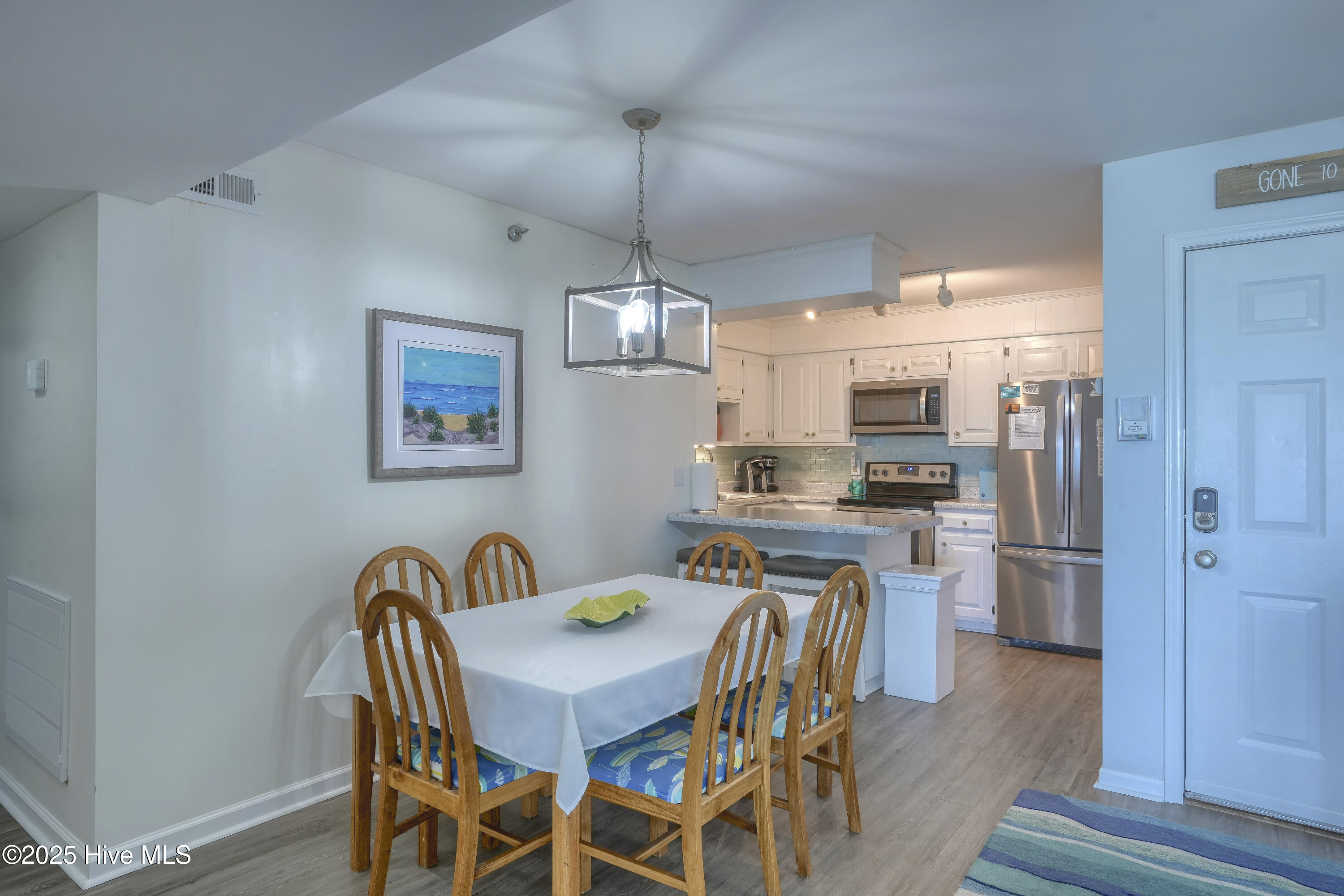 1896 New River Inlet Road Unit 1212, North Topsail Beach, NC 28460 – photo 5: Dining