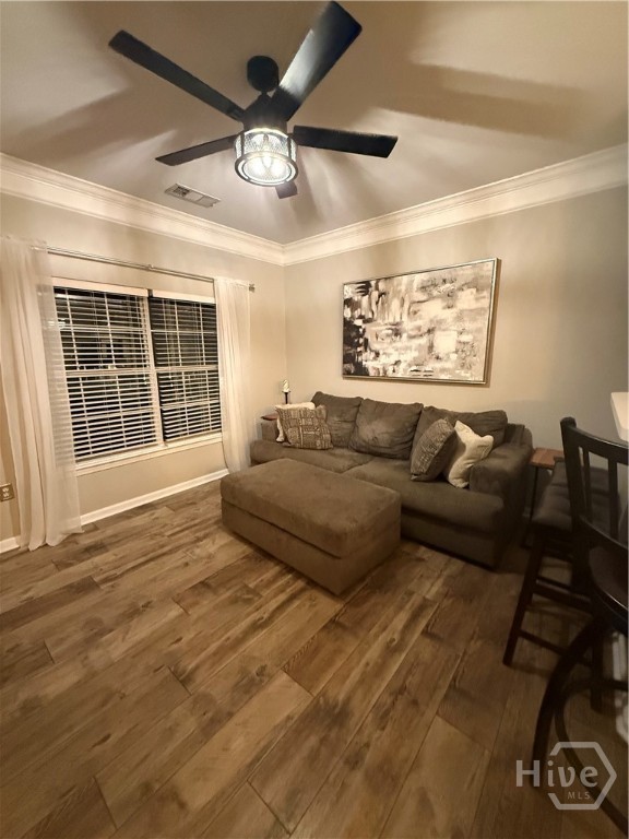 Den with LVP flooring. New light fixtures throughout.