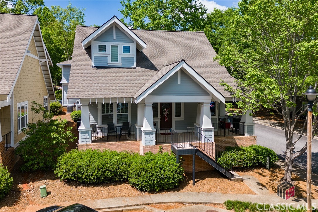 Check out this rare opportunity to own one of the largest, detached two bedroom condos and the ONLY condo with a bonus room/ loft in The Woodlands of Athens! Available for occupancy at closing - this one is NOT leased! This complex is located next to the North Oconee Greenway Bailey St & new Carriage Ln Trailheads making for easy bike/walk access to UGA and downtown. Recent upgrades have been made including fresh interior paint and new carpeting. Engineered hardwood flooring runs through all living areas including the 300sqft loft/ bonus space. Because this is a detached unit, an abundance of windows brighten each room. All appliances in kitchen with breakfast bar convey with the sale. Whether you utilize it as a home office, bonus room, or guest bedroom, the loft offers great flexibility. The primary suite with private bathroom is located at the rear of the unit. Laundry closet is centrally located making it easy for housemates should you choose to have any! Spacious front porch for chillin' with your friends, and a covered back porch is perfect for grilling. The Woodlands of Athens offers multiple amenities including a huge pool and clubhouse, tennis courts, volleyball court, greenspaces, and gated front entry. Conveniently located near the UGA Vet Teaching Hospital, North & South Campuses, and all the great restaurants and shops of Downtown Athens!