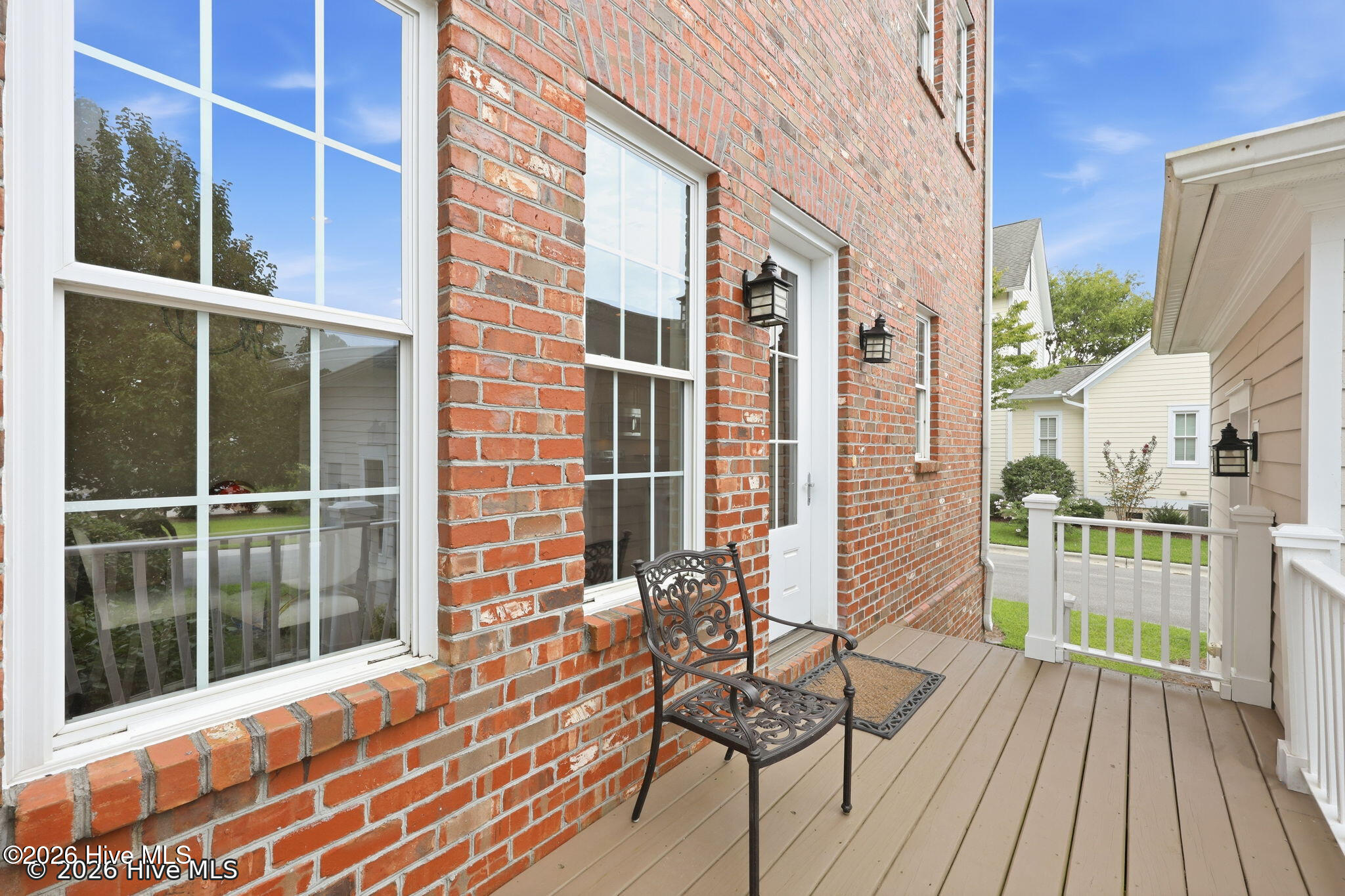 Back Porch Showing Rear Entry Door + Garage Man Door