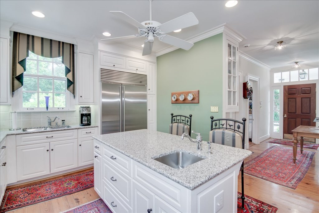 Off the kitchen is a pantry & laundry room