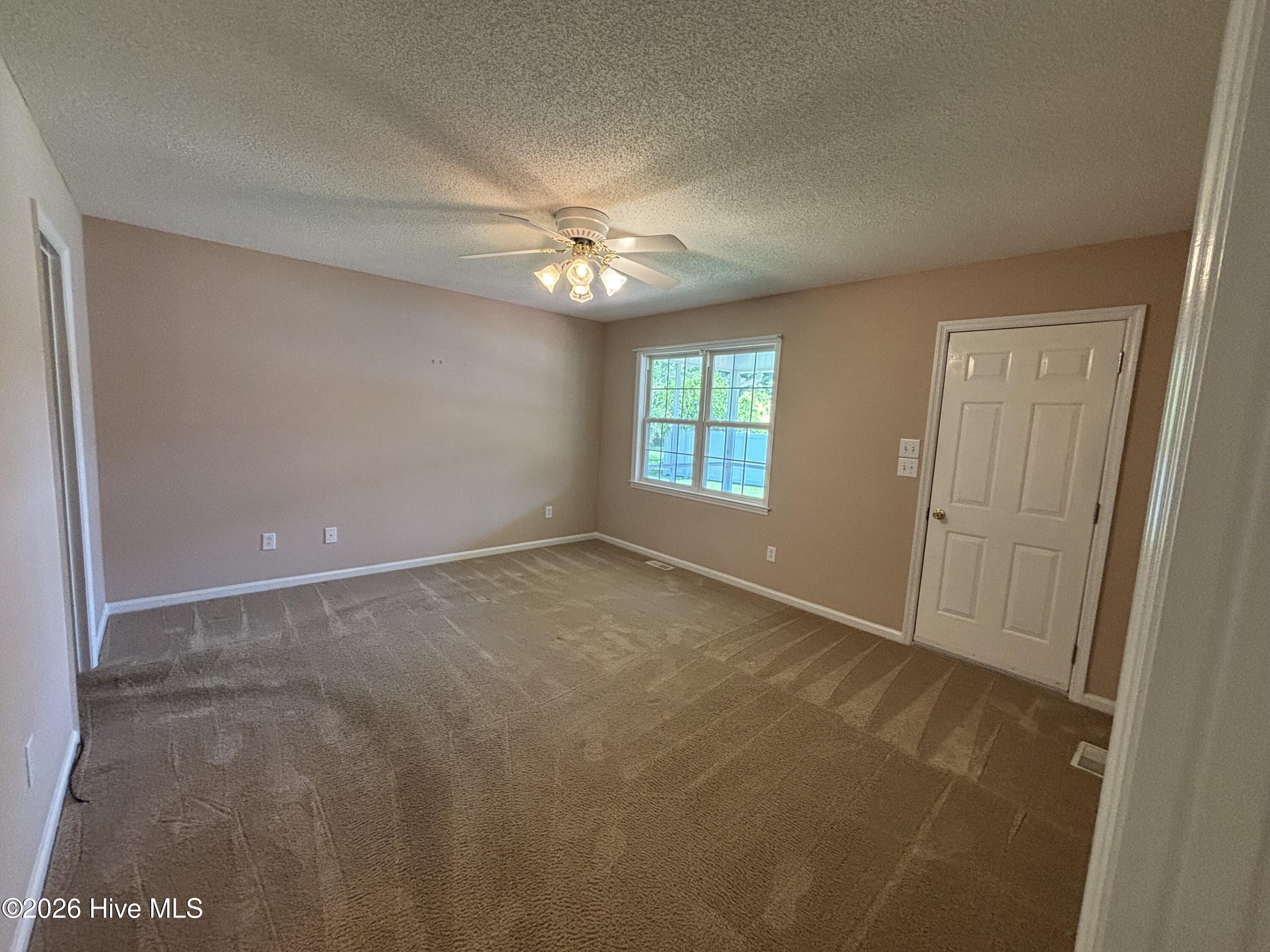 Master bedroom has exterior door to screened porch