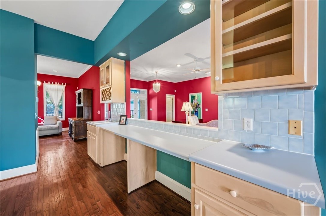 Additional view of wet bar and connecting den.