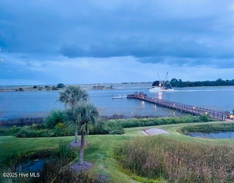 1135 Park Road SW Unit 4201, Sunset Beach, NC 28468 – photo 6: Watch fishing boats go by.