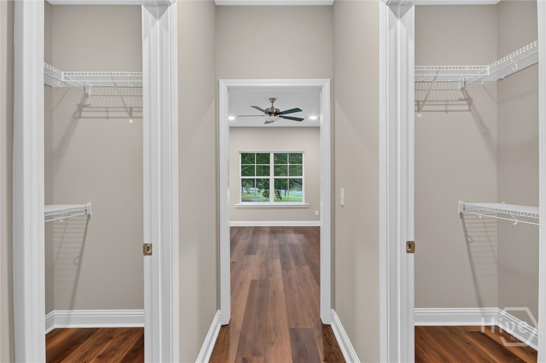 Dual closets in primary bedroom