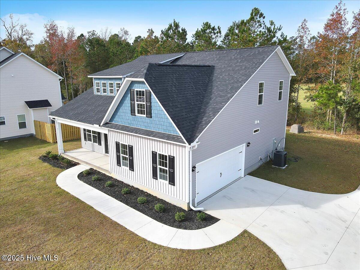143 Bayside Drive 22, Sneads Ferry, NC 28460 – photo 2: 003-Final Sample Model Home Compl-RJREM-
