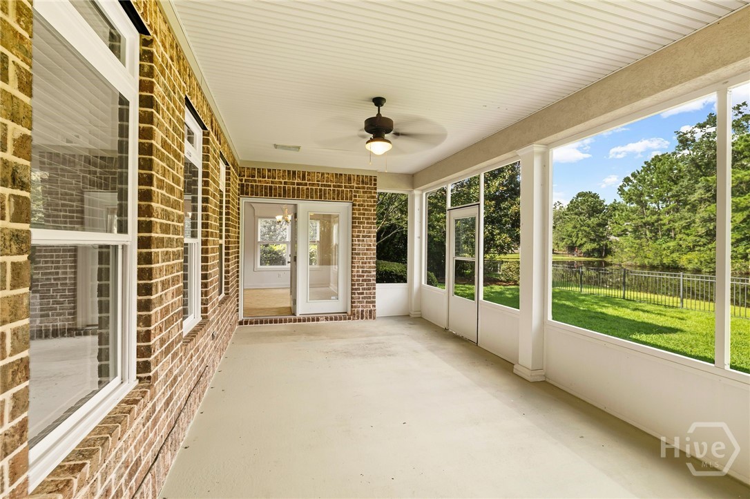 Screen porch with view of the pond