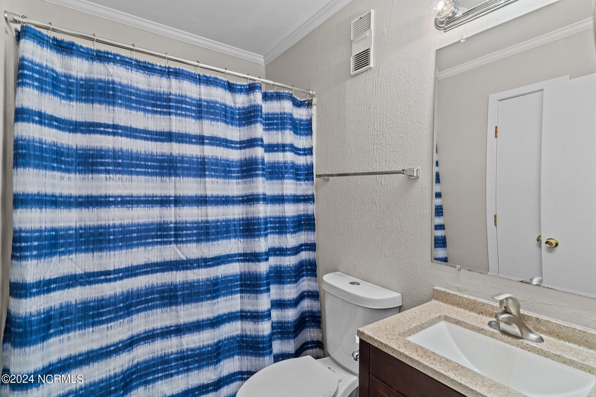 1404 Canal Drive Apt 17, Carolina Beach, NC 28428 – photo 17: 18-web-or-mls-BTS08429