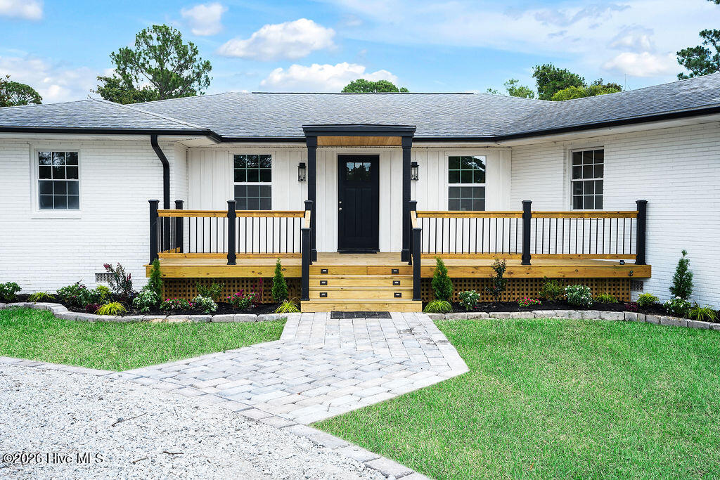 Exterior photo of 701 Pine Valley Drive, Wilmington, NC 28412. MLS: 100592861
