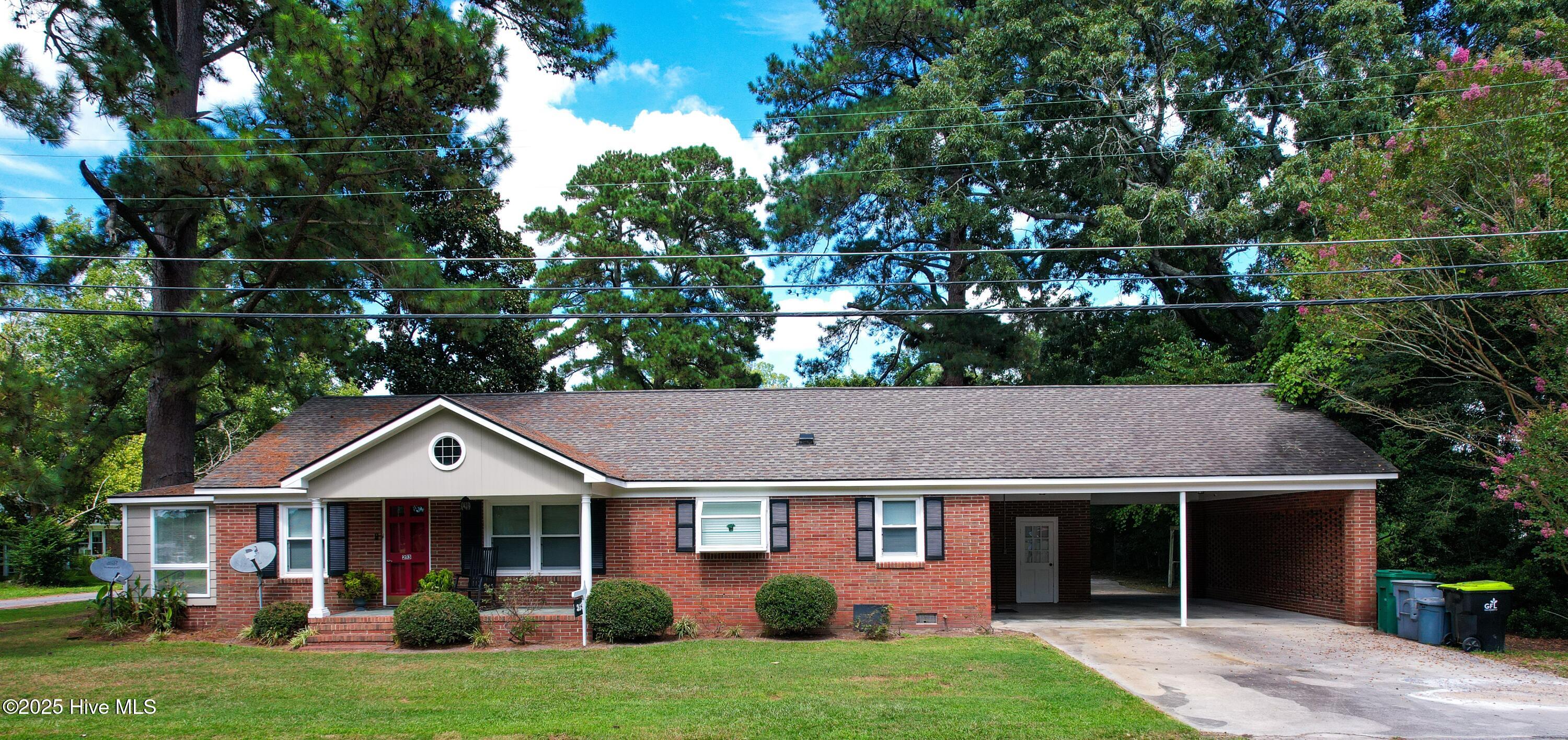 Welcome to this stunning, recently renovated 4-bedroom, 3 full bath brick home, perfectly situated on a spacious corner lot. Featuring an open floor plan designed for modern living, this home seamlessly blends comfort, style, and versatility.

Step inside to find a bright and airy living space with tasteful updates throughout. The heart of the home boasts a large living and dining area that flows effortlessly into a modern kitchen—ideal for entertaining or family gatherings. There is also a formal dining room. 

The spacious master suite includes a private sunroom with skylights—your own serene retreat, perfect for morning coffee or evening relaxation. Three additional bedrooms provide ample space for family, guests, or hobbies.

A private heated space offers exceptional versatility, making it well-suited for multi-generational living and easily adaptable as an in-law suite, guest residence, or executive home office.

Major updates include a new roof (2017) and a brand-new HVAC system (2024), ensuring peace of mind for years to come.

Don't miss this rare opportunity to own a beautifully updated home with unique features and flexible living space. Schedule your showing today!