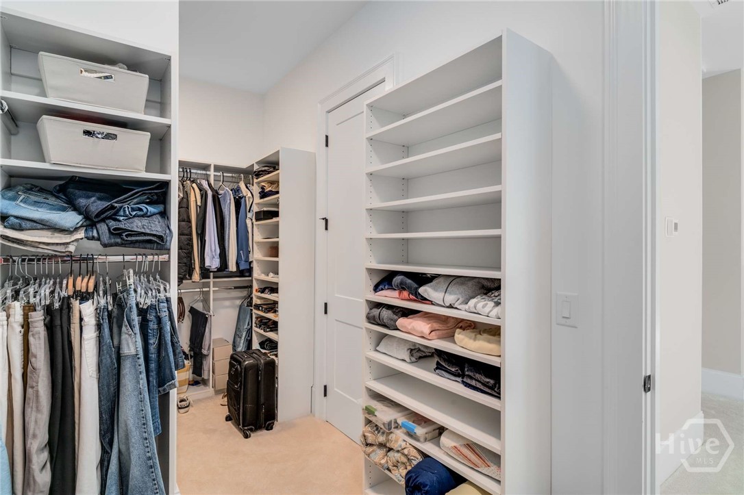 Primary closet with custom shelving