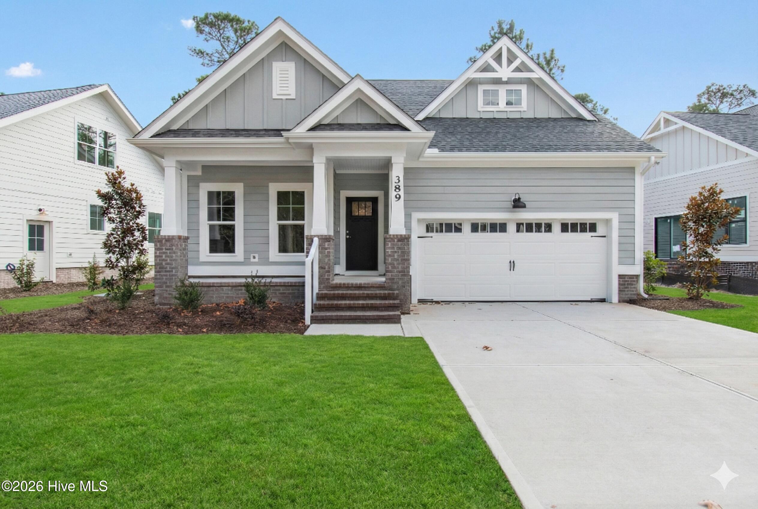 Attractively appointed and perfectly sized, this newly constructed home has so much to offer. Enjoy 1st floor living with an open floor plan that includes upgraded finishes and professional appliances in the kitchen and a Great Room with coffered ceilings and gas fireplace, surrounded by custom built-ins. Spend late afternoons in the sunroom and step out on to your patio when it's time to put dinner on the grill! Additional features including an Owner's Suite with a custom tiled walk-in shower and large closet, a 2nd floor Bonus Room with a full bath and a generous laundry room tucked behind a pocket door are what makes this house one you don't want to miss.