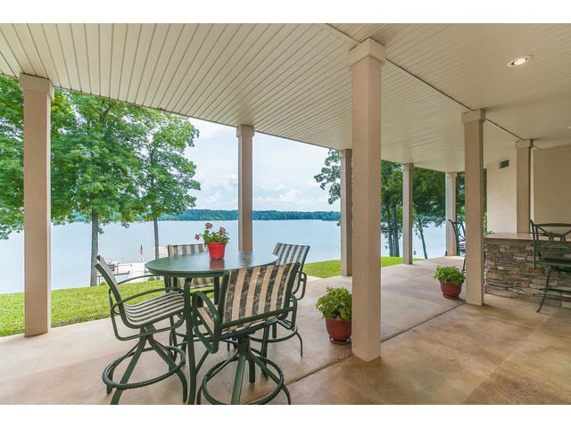 Lower level covered patio with lake views