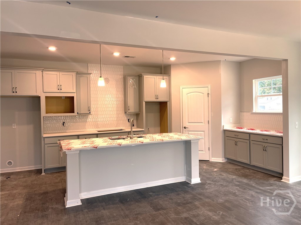 Tons of Cabinets, Double Ovens and Large Island