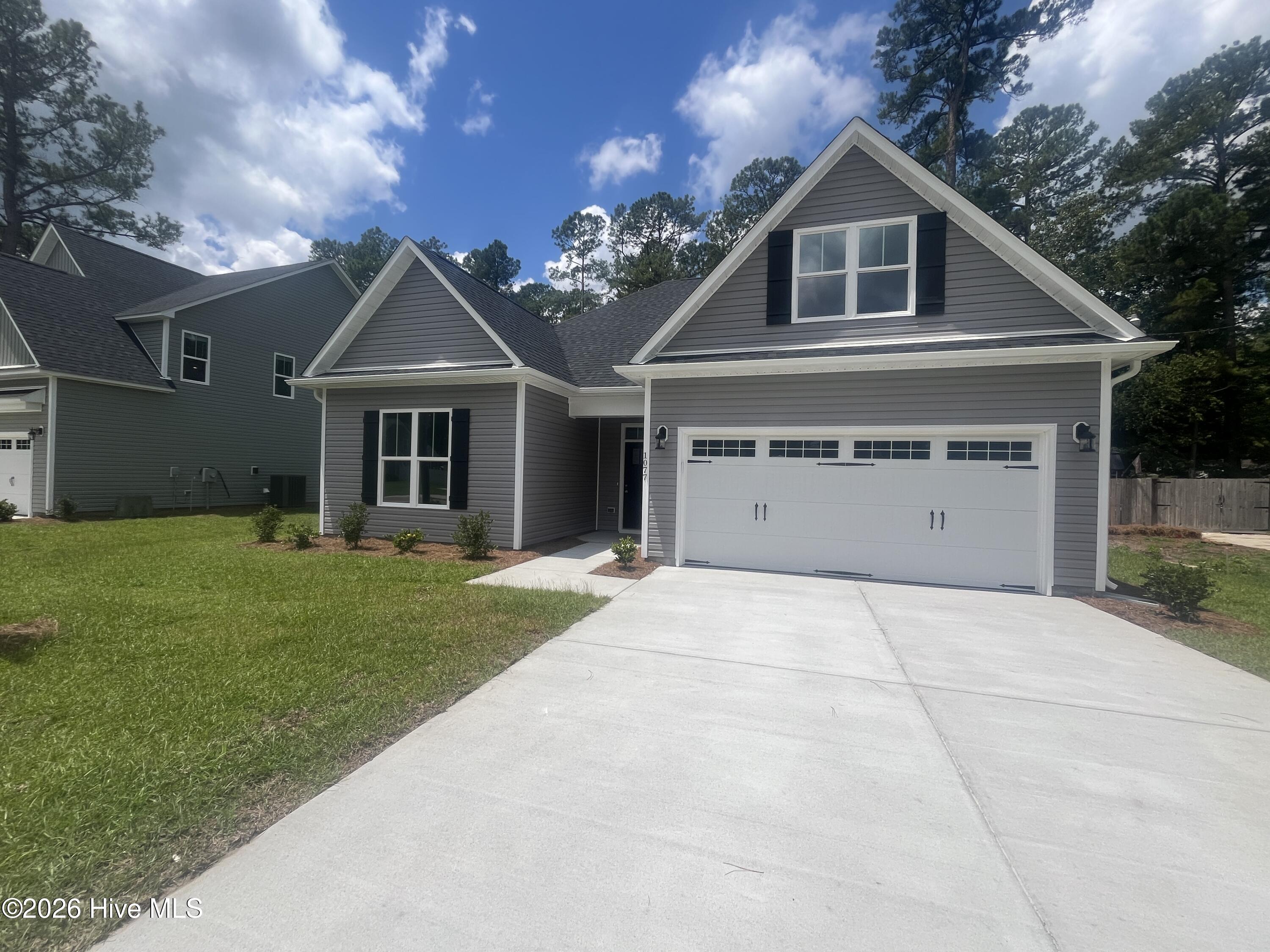 Exterior photo of 1077 Echo Drive NE, Leland, NC 28451. MLS: 100568374