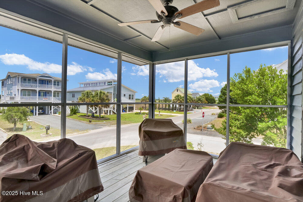 308 N Shore Drive E, Sunset Beach, NC 28468 – photo 8: Screened Porch