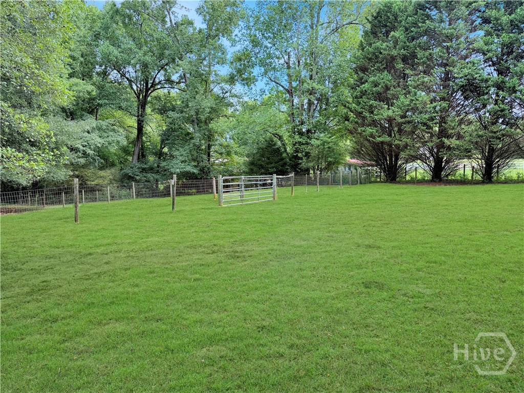 This pasture is back by the barn.