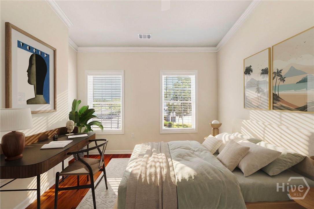 Virtually staged guest room as bedroom / office combo.