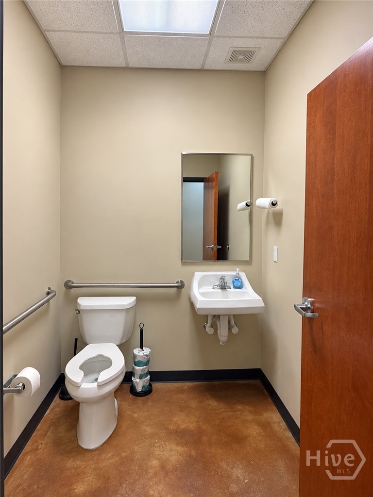 ADA-accessible restroom with grab bars