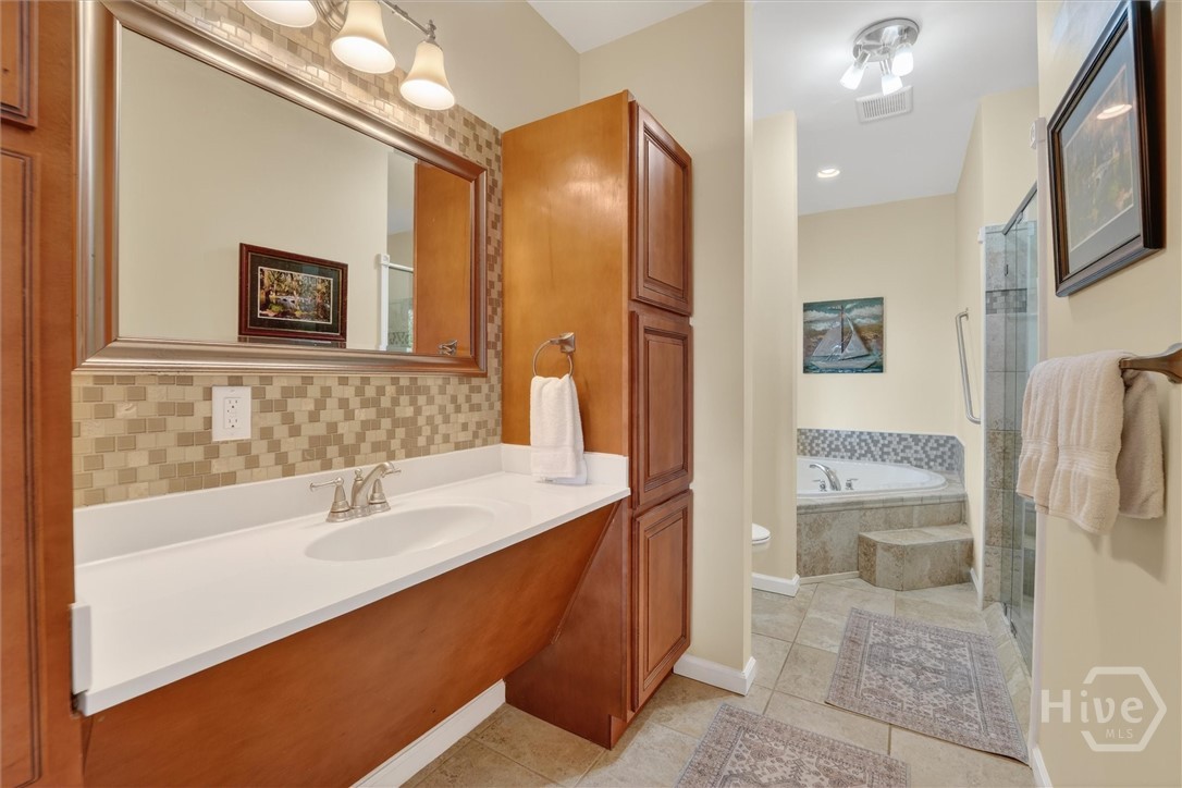 Primary en-suite. Wheelchair accessible