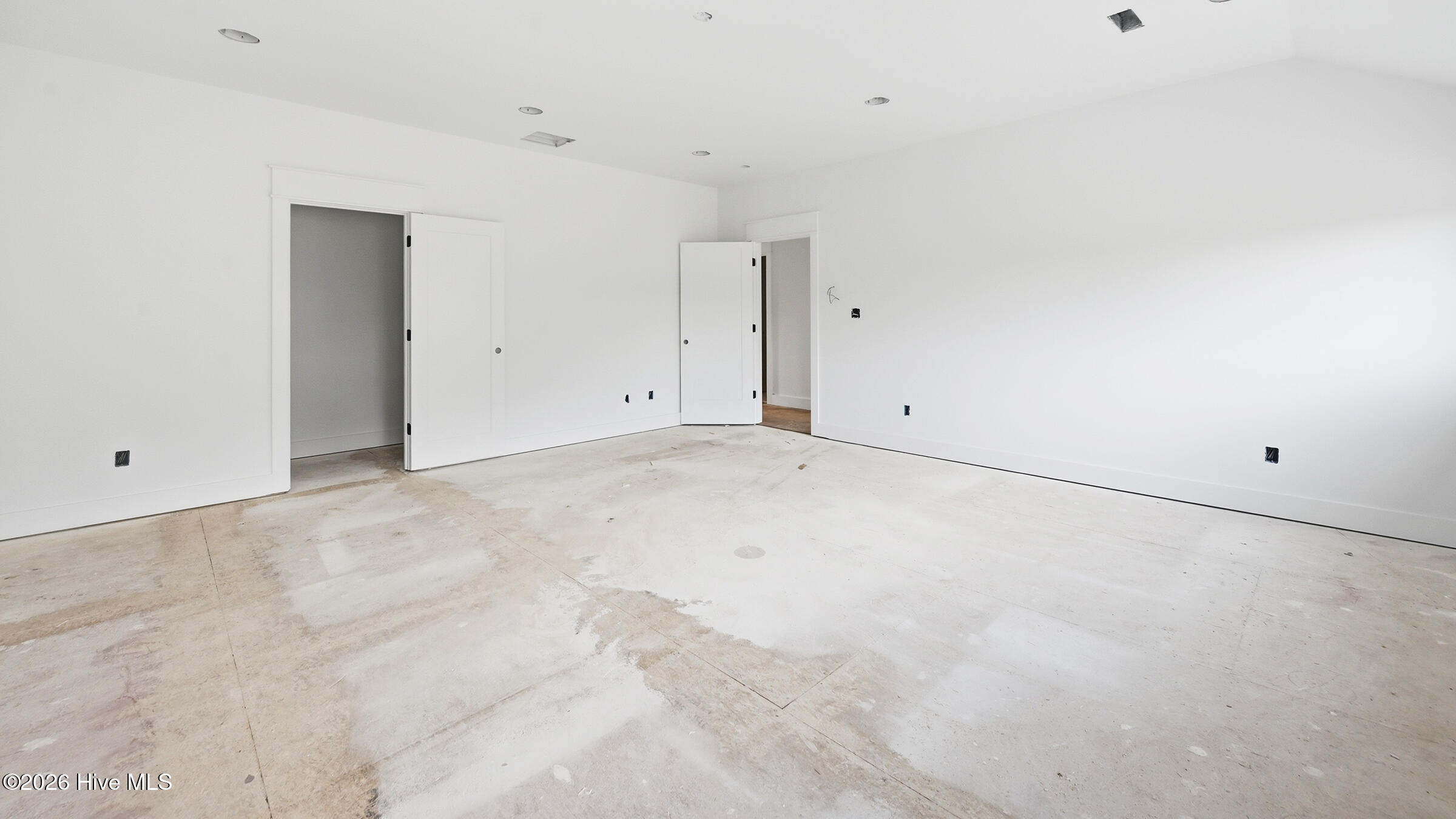 bonus room offers half bath and a floored walk in attic